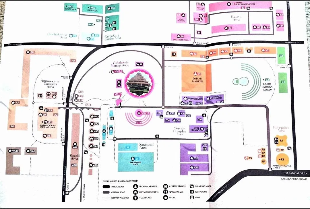 Map of the Art of Living International Center, Bengaluru — program venues (Dhyan Mandir, Vishalakshi Mantap), accommodation areas, dining halls, gates, reception, shuttle stands, drinking water, restrooms and shops.